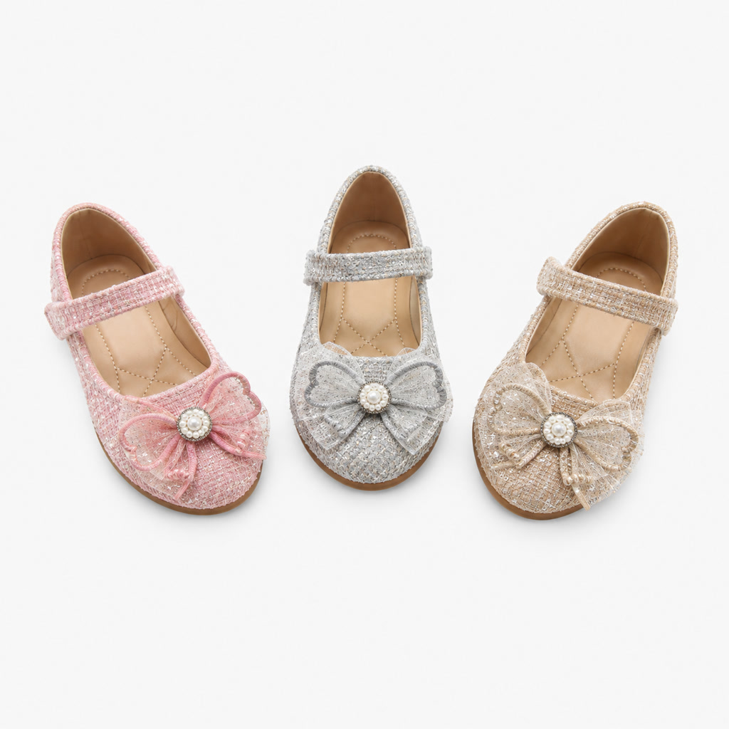 Zapato de charol para niña con moño de contorno oscuro
