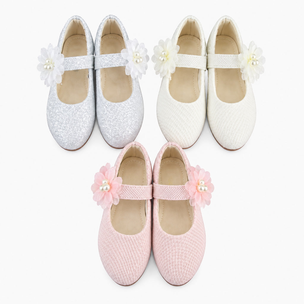 Zapato de charol para niña con moño plano y detalle brillante