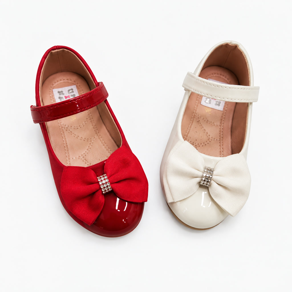 Zapato de charol para niña con moño grande y centro brillante